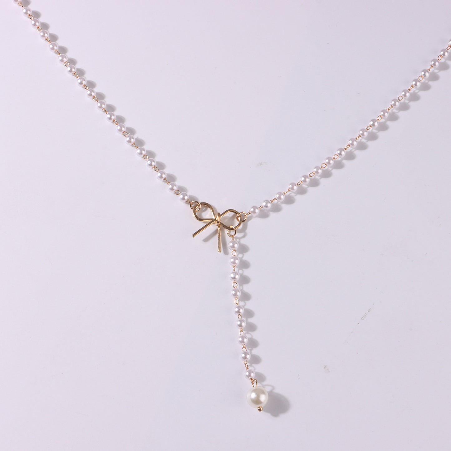 Women's Bow Pearl Tassel Pendant Necklace Simple All-match